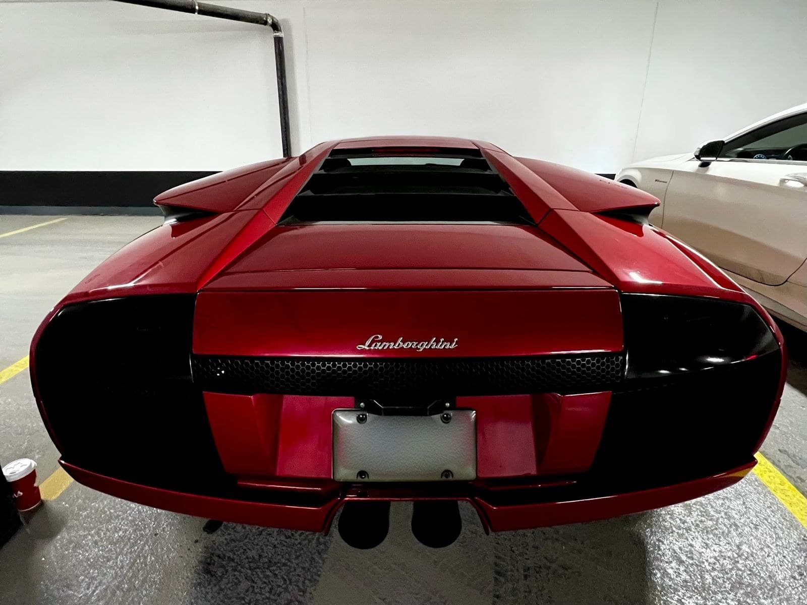 Rear view of the 2004 Murciélago — Lamborghini script and smoked taillights