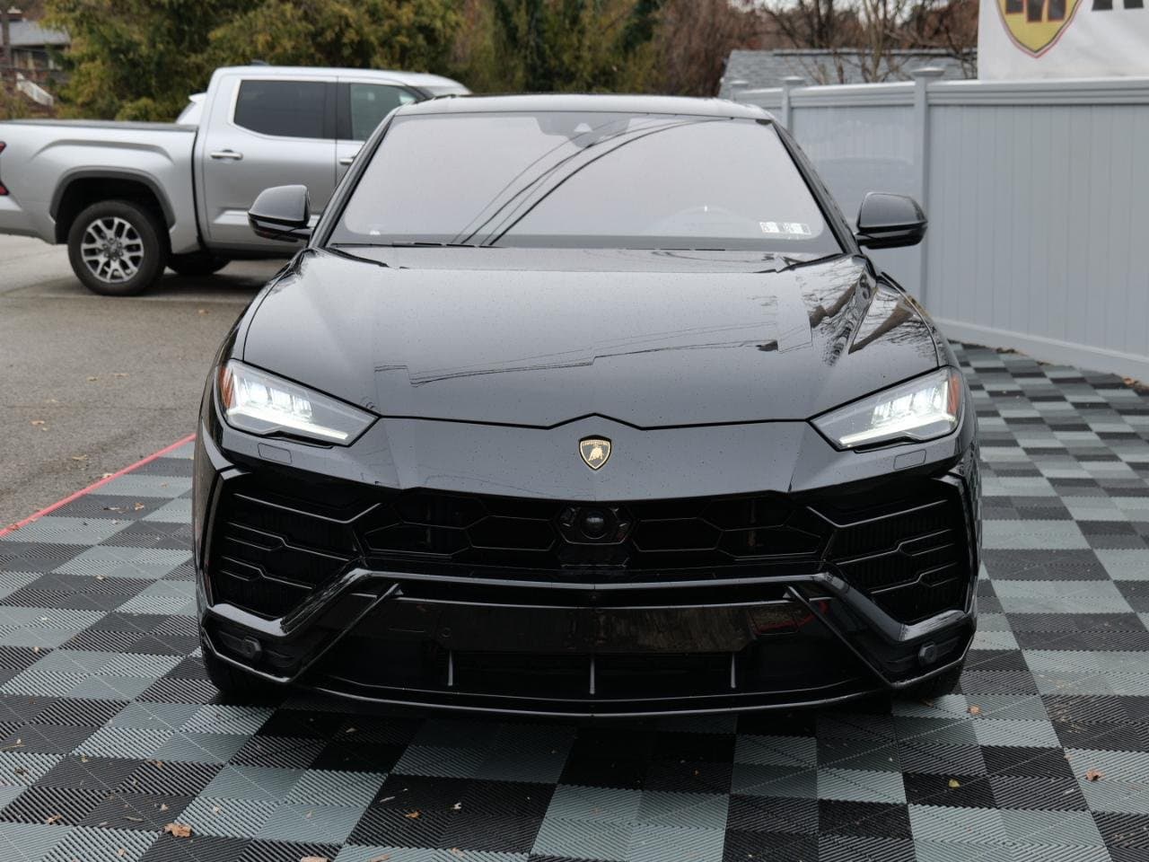 Head-on front view of the black 2021 Lamborghini Urus