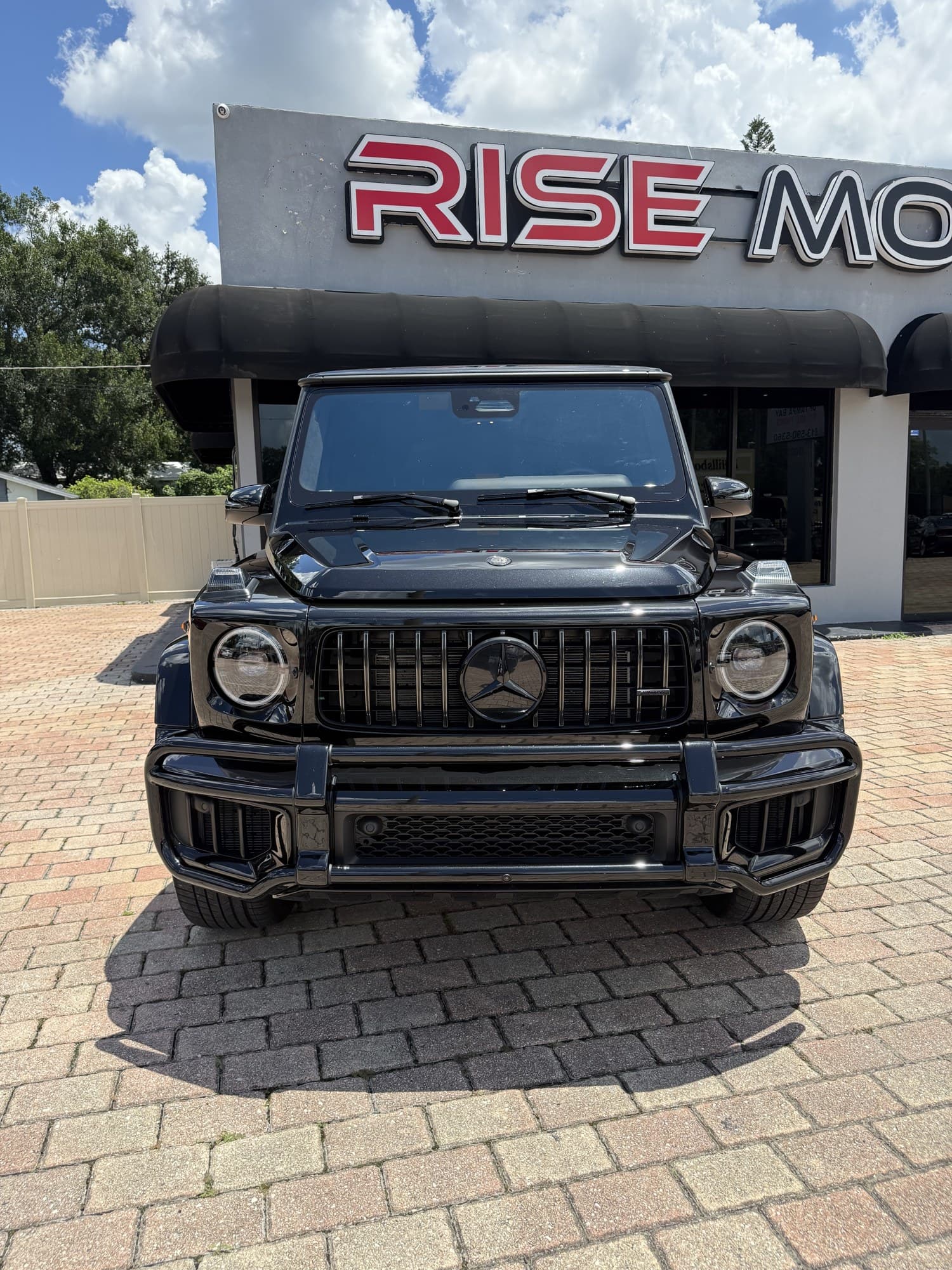 Head-on front view of the blacked-out 2025 Mercedes-AMG G 63