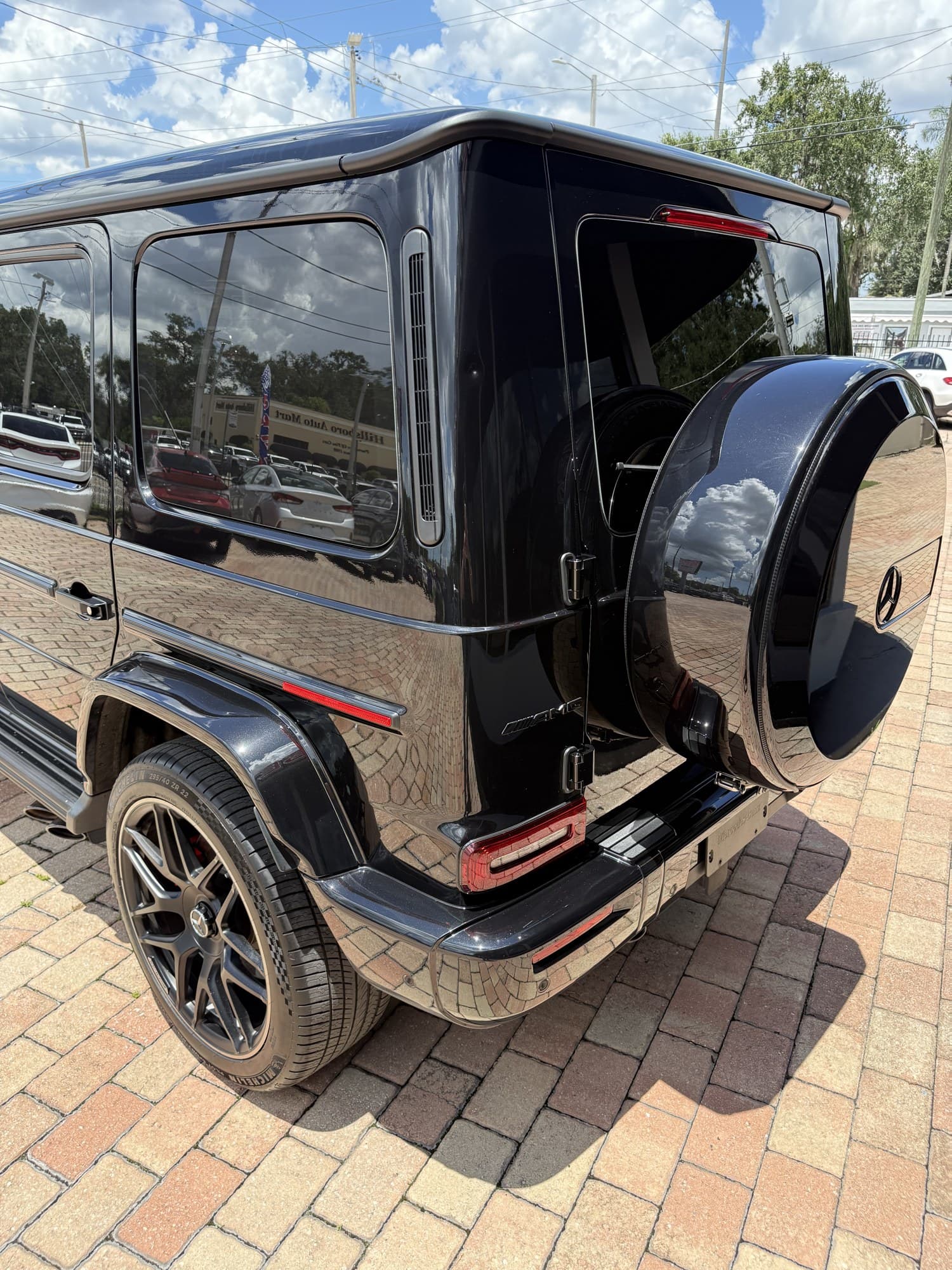 Rear three-quarter view of the 2025 G 63 with its body-colour spare-wheel cover