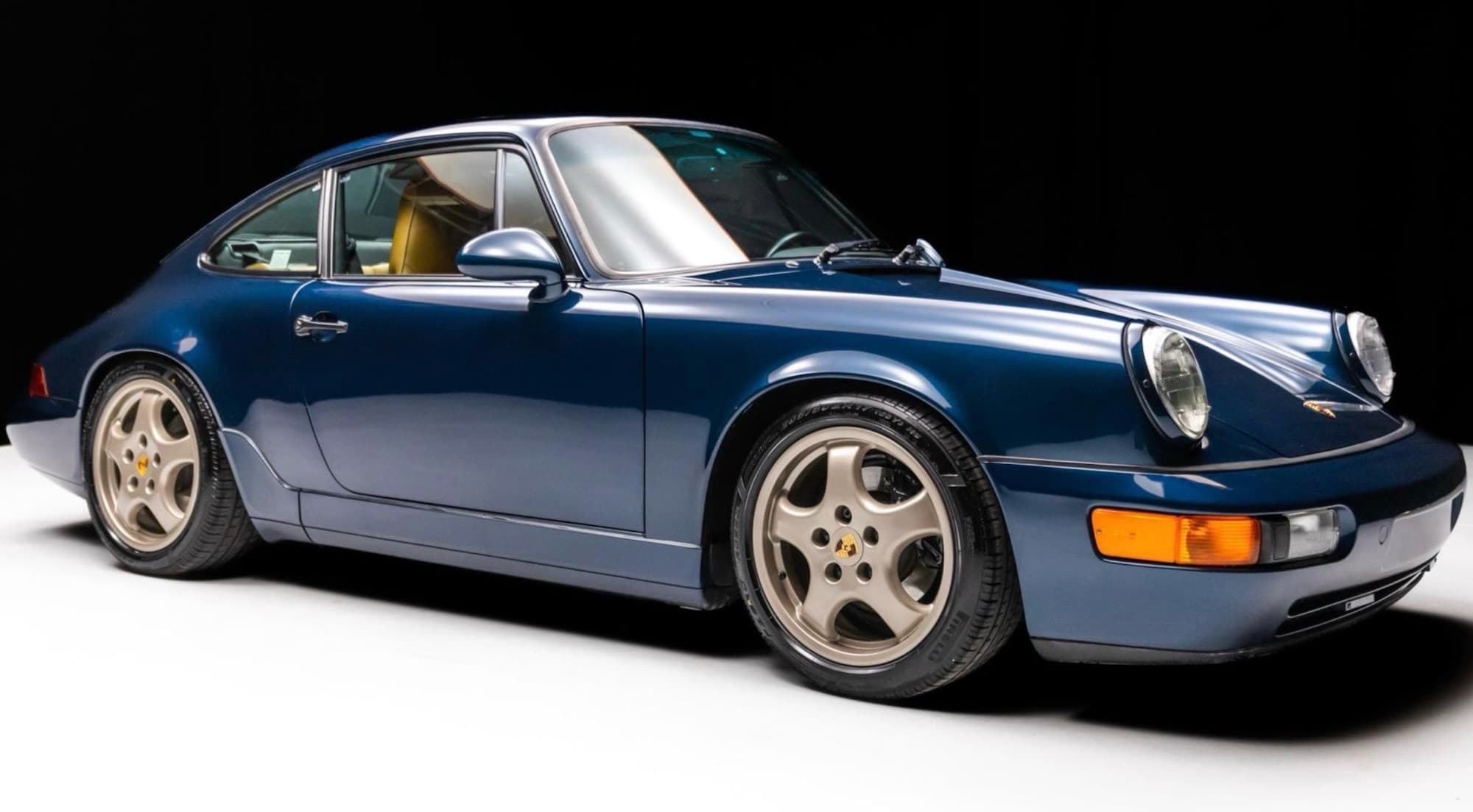 1993 Porsche 911 Carrera 2 (964) in Amazon Green Metallic over tan leather — sold and delivered by DDE Rentals