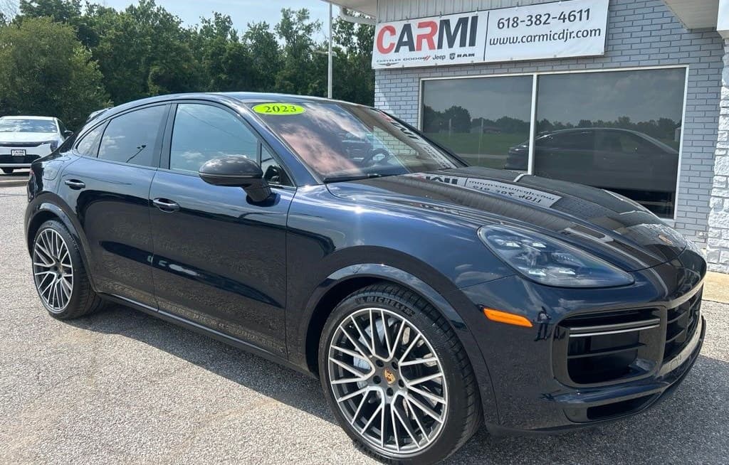 Front three-quarter view of the 2023 Cayenne Turbo Coupe on its 21-inch Turbo wheels